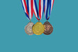 © Igor - collection gold, silver, bronze medal against blue sky. award and victory concept
