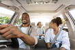 © Prostock-studio - Happy African American Family Driving New Automobile Having Ride In City, Enjoying Road Trip. Parents And Daughter Spending Vacation Traveling By Car. Auto Purchase And Rent. Selective Focus