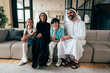 © oneinchpunch - Traditional arabian family from Dubai spending time together at home