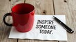 © Musfiqur - Inspirational note beside a coffee mug