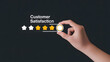 © PixelOriel - Hand touching glowing star, customer satisfaction evaluation and feedback, excellent service experience