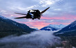 © edb3_16 - Futuristic Space Ship Soars Above Snowy Mountains at Sunset Over a Misty Valley Landscape