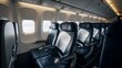 © Qii Stock - Interior of Modern Airplane Cabin with Empty Blue Leather Seats