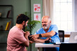 © StockImageFactory - Indian male doctor checcking BP of young patient during routine clinic checkup
