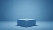 © sultan - Elegant monochrome studio shot featuring a blue cube platform against a subtle backdrop