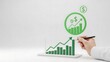 © Mohammad - Business professional indicates positive financial growth trend by pointing a pen at a rising green bar chart representation of profits