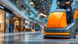 © Alex Alex - A floor-cleaning machine on the move in a shopping center. For cleaning, janitorial, commercial, and public space maintenance.