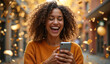 © Rhony - Young woman looked exited looking at her smartphone and was surrounded by gold confetti.