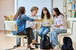 © Valerii Honcharuk - Group teamwork, students teenagers sitting in circle with female teacher, counselor