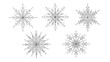 © Luther - Collection of five unique and intricate black snowflake designs with delicate geometric patterns isolated on white background.
