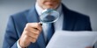 © Vibe Stock - Business documentation inspection: Man examines text detail with magnifier, explore paper, analyze document composition, auditor checks information, professional research, inspect page datum, concept