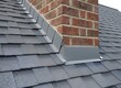 © night - Roof with Grey Shingles and Red Brick Chimney Symbolizing Residential Architecture and Construction, Building Maintenance, and Home Improvement