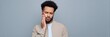 © Andrii Zastrozhnov - Young african male experiencing toothache against gray background
