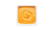 © Jn - Creamy cheese sauce in square bowl isolated PNG, delicious cheddar dip for nachos and snacks on transparent background