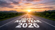 © abdul - New year text 2026 written on asphalt road with sunrise sky. Nature landscape with highway road leading forward to happy new year