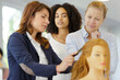 © auremar - hairdresser apprentice on dummy head