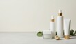 © Blackmint Studio - Minimalist Luxury Skincare Product Set with White Containers and Gold Accents on Neutral Background