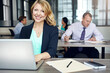 © BuyoutReese05/peopleimages.com - Happy, laptop and portrait of business woman in coworking office for planning or research. Computer, report and typing with smile of employee at desk in workplace for review of online information