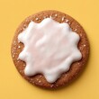 © VILENA - Gingerbread cookie with white icing on yellow background, round biscuit mockup with sugar sprinkles, minimalist food art