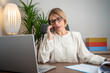 © Nenad - Mature business woman having a lot hard work and many trouble per day
