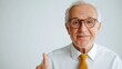 © Design Depot - Excited senior gentleman celebrating financial success with a thumbs up