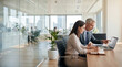 © Five Million Stock - Two professional business people working together. Partners mature man and woman discussing project in office. Team leader explain trainee working process using tablet pc computer. Banner, copy space