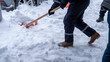 © MahmutSonmez - Municipal workers are cleaning the sidewalks blocked by snow. snow removal workers with snow shovels