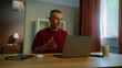 © Татьяна Епанешникова - Man business worker remote hard work laptop home. Guy talk video call. Male employee virtual meeting. Busy ceo person use pc. Online education. Computer freelance conference. Distant job interview.