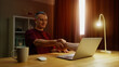© Татьяна Епанешникова - Business man shake hand remotely, handshake through laptop screen. Conclusion agreement at home. Male employee virtual meeting. Successful distant job interview. Guy deal video call. Work conference.