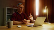 © Татьяна Епанешникова - Man see middle finger remote, obscene hand fuck you off gesture from laptop screen. Person visit suspicious phishing scam website. Online gambling fail. Work failure. Funny joke, humor. Internet fraud