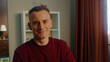 © Татьяна Епанешникова - Smiling hapConfident serious happy man worker work laptop home. Successful guy look at camera smile. Male employee portrait. Busy ceo person use pc. Online education student. Computer freelancer. Dist