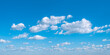 © AVTG - Panoramic background of perfect blue summer sky with beautiful cumulus clouds