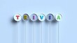 © RASHIDAPARVIN - Six colorful alphabet letters spell out 'TRIVIA' in round white buttons with thin stems on a light blue background, abstract representation of knowledge and games.