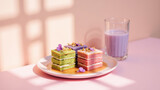 Delicious layered desserts with vibrant colors, garnished with flowers, served on plate alongside glass of purple beverage