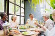 © Rawpixel.com - A diverse group of elderly friends, including men and women, enjoying a meal together. Elderly friends laughing, sharing wine, and dining in a cozy, sunlit room. Wine lunch fore retired men and women.