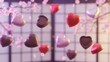 © void embers atelier - Detailed 3D Valentine scene showing heart-shaped chocolates gently hovering over a pastel backdrop, with smooth lighting enhancing texture and intimate seasonal mood.