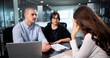© Andrey Popov - Unhappy Manager Conducts Disciplinary Meeting With Stressed Employee