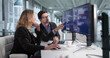 © Andrey Popov - Male And Female Programmers Developing Cybersecurity Software