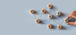 © LAONG - Organizational network structure with connected people icons on wooden blocks, showing team collaboration, stakeholder mapping, social graph, and business communication on a light background