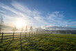 © Steven - English countryside picture showing a green field at sunrise with a wooden fence acting as a strong leading line. Vibrant blue sky adds to to rural lifestyle and country life feel.