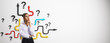 © Who is Danny - Thoughtful woman standing in front of colorful arrows and question marks symbolizing decision making and uncertainty on white background.
