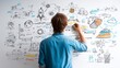 © Wasun - Entrepreneur shaping unique value proposition diagram on whiteboard with colorful business strategy sketches and charts, creative planning and innovation process in office environment