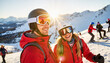 © Valeriy - Couple smiling in ski gear on snowy mountain, winter adventure