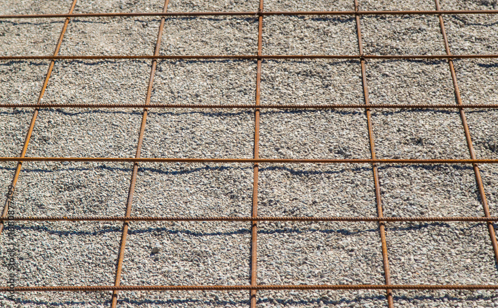 Knitting metal reinforcement for a swimming pool. Selective focus.