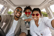 © Prostock-studio - Cheerful African American Family Of Three Posing In Car, Wearing Sunglasses. Parents And Preteen Daughter Traveling By Automobile In Summer. Road Trip Adventure Concept