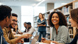 © Bery - Students Collaborating in a Modern Library Environment with Books and Laptops