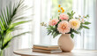 © wolfelarry - Wooden coffee table near window with flowers vase and books stack. Light filters through sheer curtains. Indoor plant nearby creates