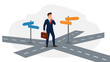 © Sagara - Businessman at crossroads making a difficult decision, choosing direction
