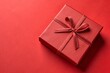 © Anastasiia Kasina - Red gift box on the red background. Copy space, top view