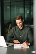 © Stock 4 You - Focused young man student using laptop computer for business studying watching online webinar e-learning training meeting writing notes. European businessman entrepreneur working in office. Vertical